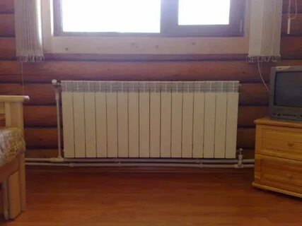 Радиаторы отопления в деревянном доме