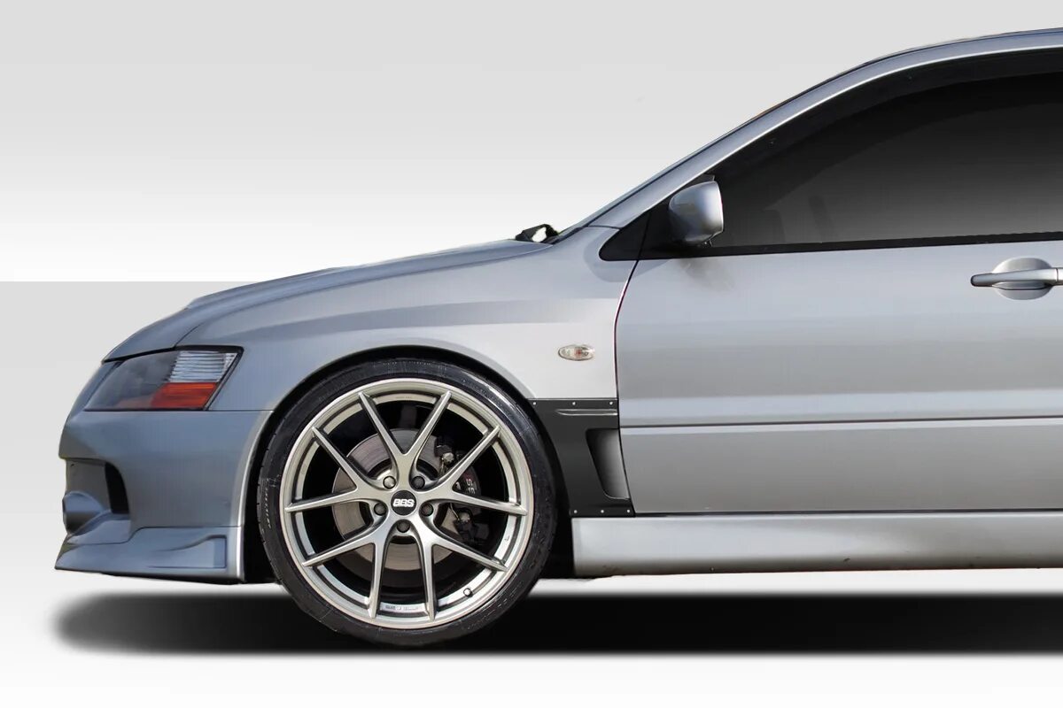 Крыло mitsubishi lancer. Лансер 9 EVO. Боди кит Лансер 9. Фендеры Mitsubishi Evolution 5. Фендер Лансер 9.