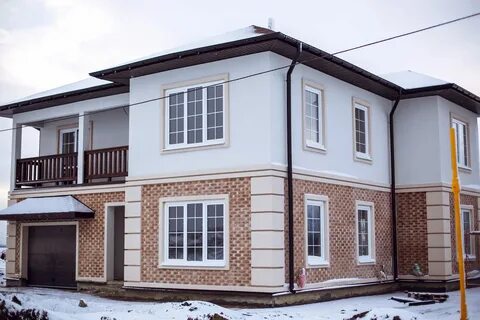 Мокрая отделка фасада дома