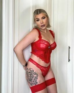 Olivia Bowen looks incredible as she poses in red lace lingerie for Valenti...