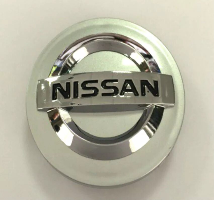 Колпачок ступицы литого диска Nissan. 60 Заглушка диска Ниссан. Колпачок диска Nissan на литые диски r15. Колпачок на литой диск Ниссан mcd0261na01.