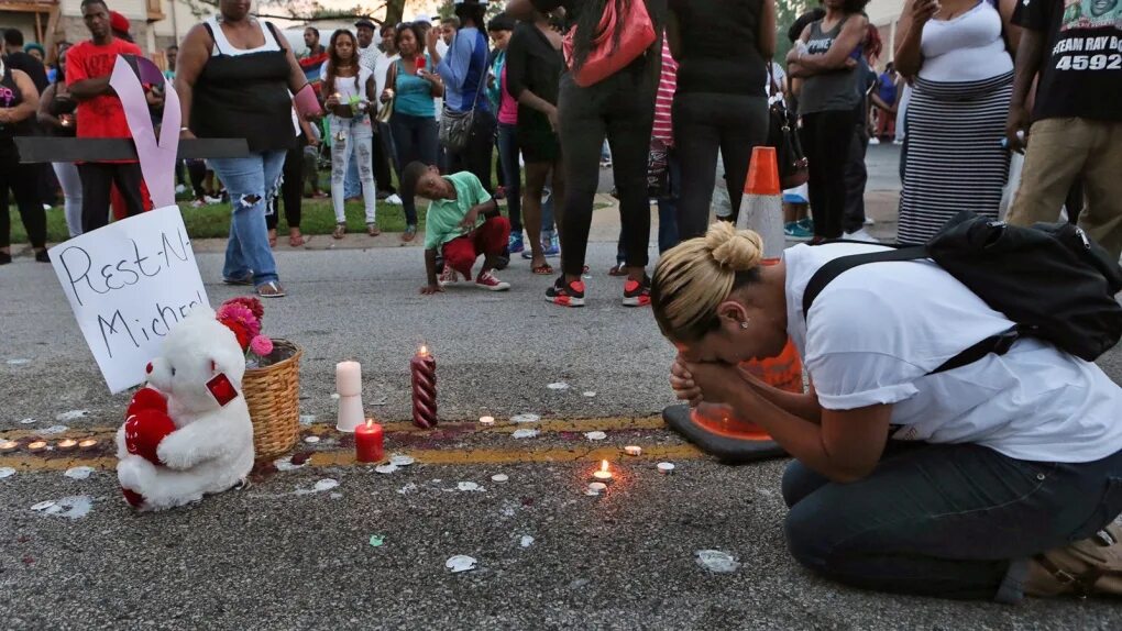 Near crowd. American Police Killed man.