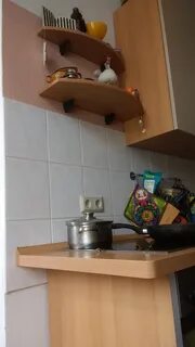 Можно вешать шкаф над плитой