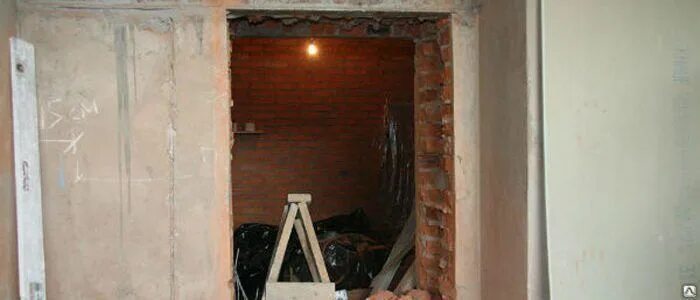 Усиление монолитных проемов. Расширение проема в кирпичной стене на 200 мм. Сделать проем бетонной стене. Сделать проем бетонной стене. Усиление проемов толщиной 580 мм металлической обоймой.
