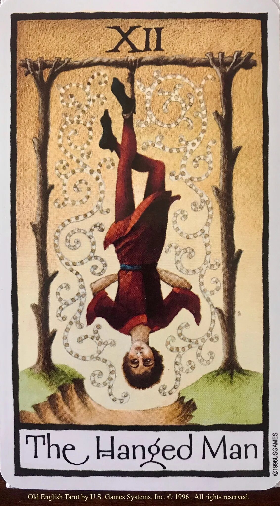 Повешенным таро значение дня. The hanged man таро. карта таро висельник. старшие арканы таро повешенный. подвешенный карта таро.