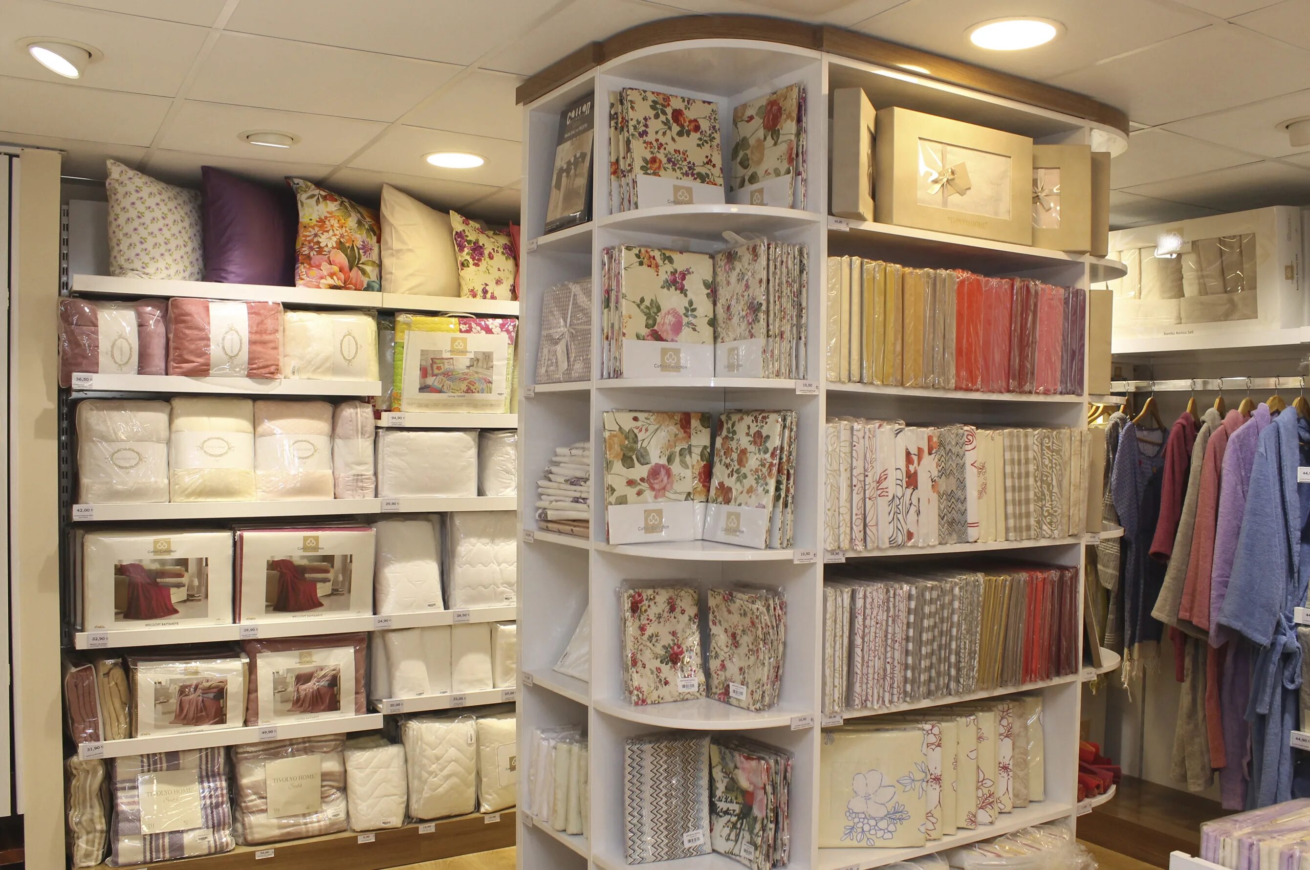 стеллажи для текстиля. магазин текстиля. аскона concept store. магазин пастельного белья. 11.
