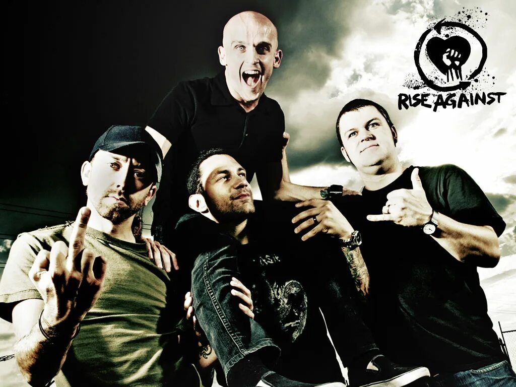 Rise against. Райз эгейнст группа. группа rise against against 2025. солист группы rise against. rise against фотосессия.