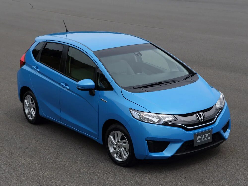 Хонда фит 2015 гибрид. Honda Fit 2013 Hybrid. Honda Fit Hybrid 2014. Хонда фит гибрид 2016. Hybrid 2014