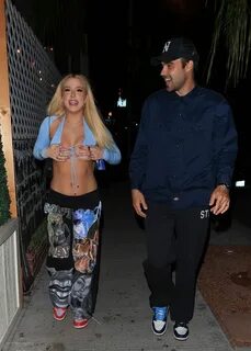 Tana Mongeau Flashes Her Boobs at Delilah (12 Photos + Video) .