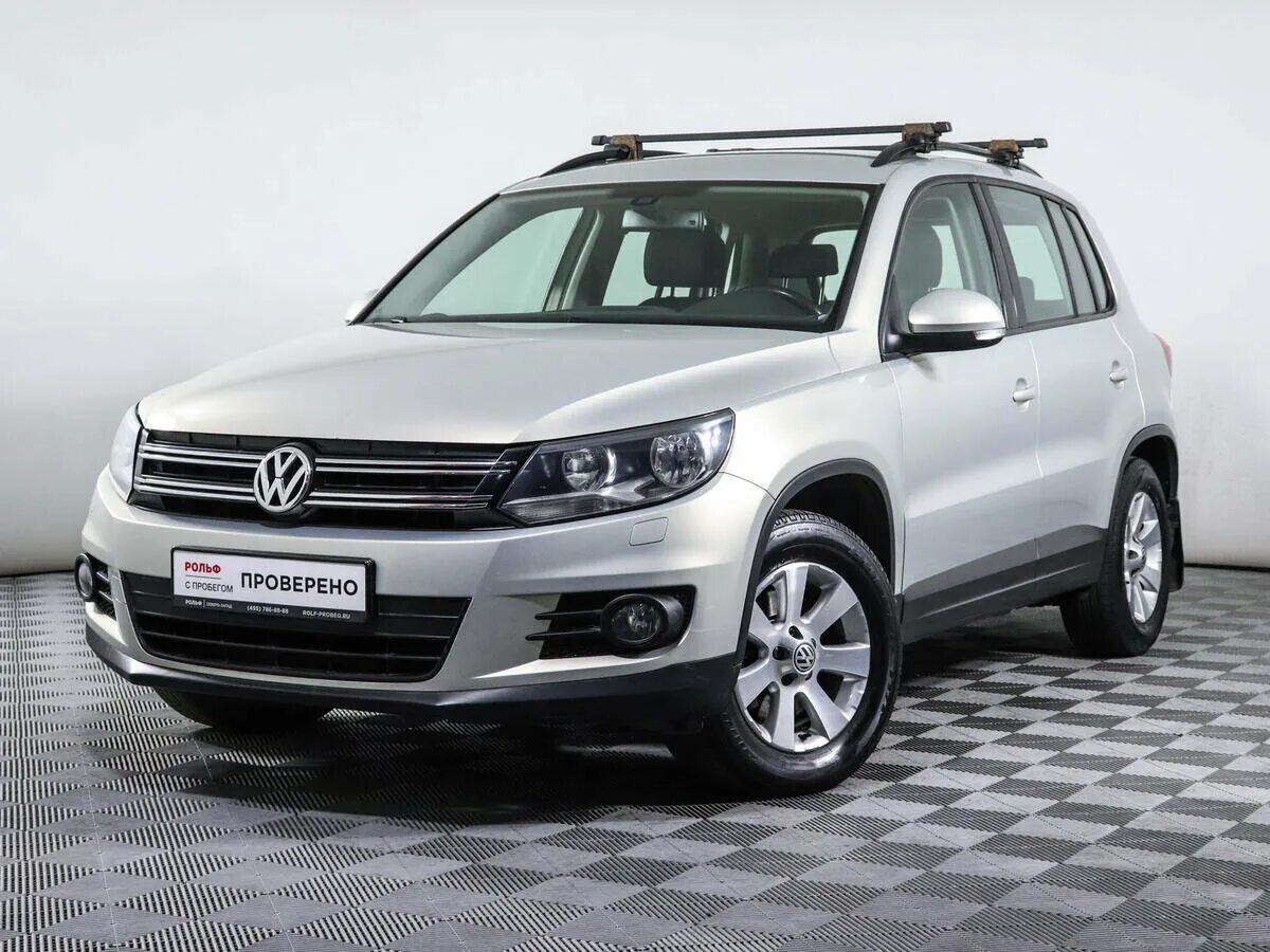 Тигуан 2013 1.4. Volkswagen Tiguan 1 дорест и рест. Тигуан 2014 1.4 механика. Серебряный Тигуан 2013 года. Фольксваген тигуан 2013 купить