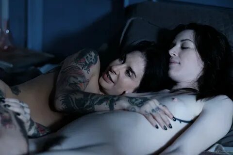 Inked slut Joanna Angel kisses and makes love to Stoya under shower.