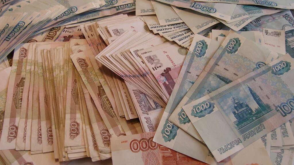 Триста миллион рублей. Деньги рубли. Стопка рублей. Стопка русских денег. Много денег картинка.