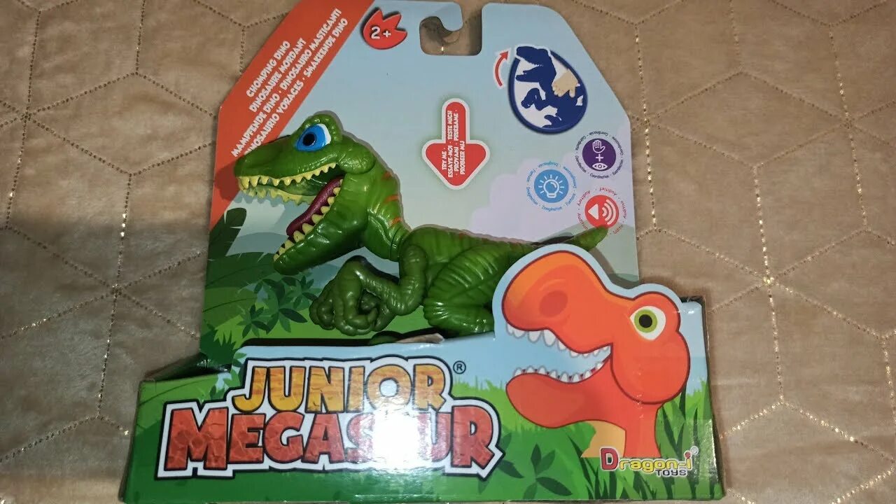 Мегазавр 2024. Megasaurus Junior игрушки динозавры. Динозавр Джуниор. Джуниор динозавр игрушка на зелёный. Интерактивная игрушка робот Dragon-i Junior Megasaur 16919.