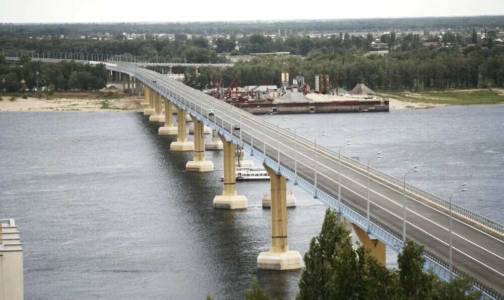 Волга река мост Волгоград. Мост через Волгу в Волгограде. Танцующий мост в Волгограде. Мост через Волгу Волгоград Танцующий. Мост через канал волгоград