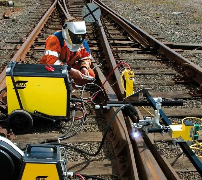 Наплавка рельсов. Railtrac bv1000. наплавка крестовин. наплавка рельс.