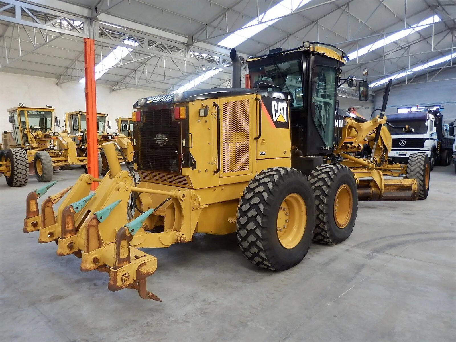 Caterpillar 140h. Катерпиллер 160 н. Автогрейдер "caterpillar 140 gc awd. Автогрейдер сат 140 gc. Автогрейдер umg аг-140.