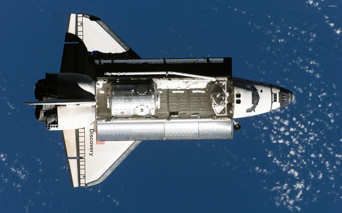 Первый космический челнок. Спейс шаттл космический корабль. Спейс шаттл Дискавери. Космический челнок Спейс шаттл. Космический шаттл НАСА Дискавери.