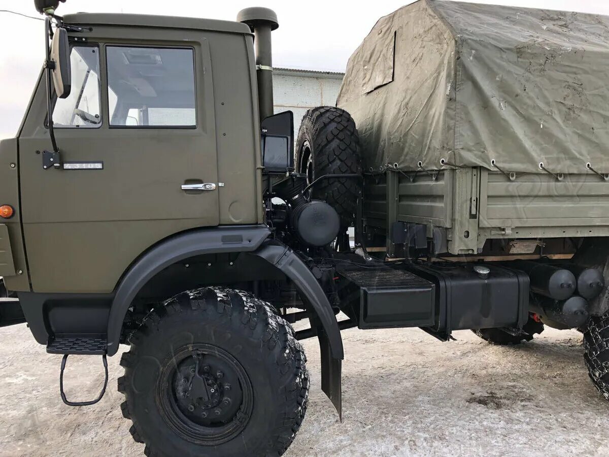 Купит камаза 4310 б у. КАМАЗ 4310 военный. КАМАЗ 4310 бортовой. КАМАЗ 4310 бортовой военный. КАМАЗ 4310 тентованный военный.