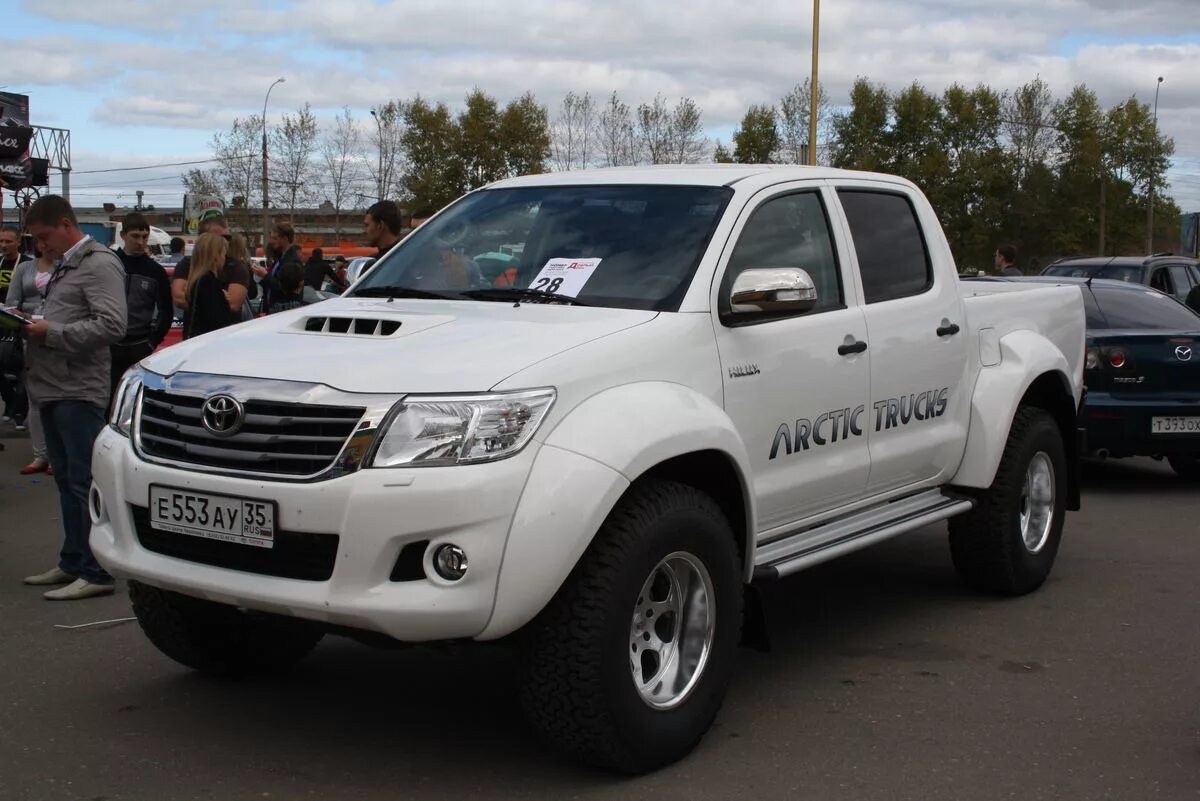 Хайлюкс купить бу россия. Hilux 2012 Arctic Trucks. Toyota Arctic Truck Hilux 2012. Toyota Hilux 2015 Арктик трак. Toyota Hilux Arctic Trucks 2022.