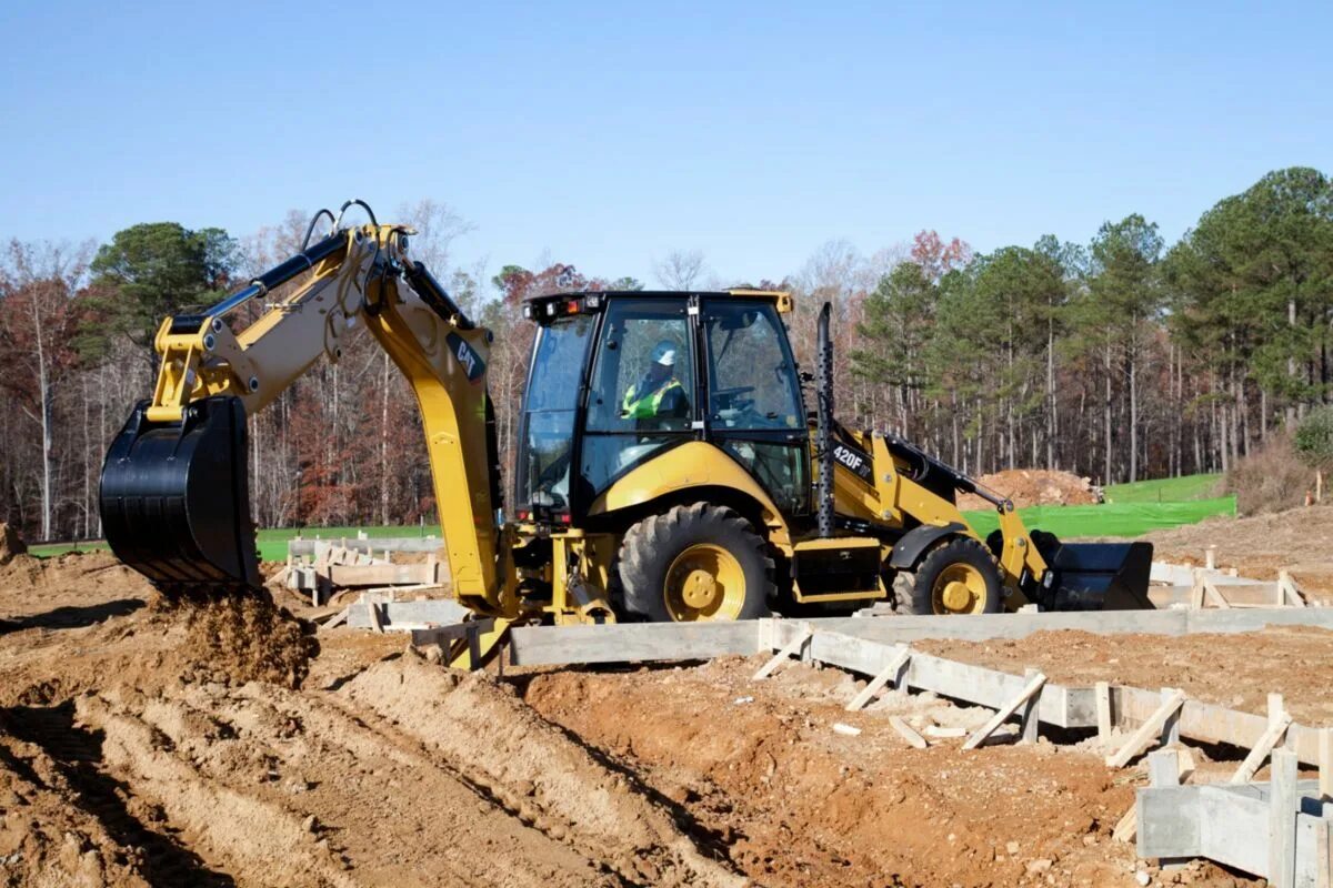 Экскаватор-погрузчик Caterpillar 428e. Экскаватор-погрузчик Caterpillar 450. Экскаватор-погрузчик JCB 4cx траншея. Экскаватор-погрузчик «Caterpillar 440 e». Экскаватор погрузчик снять