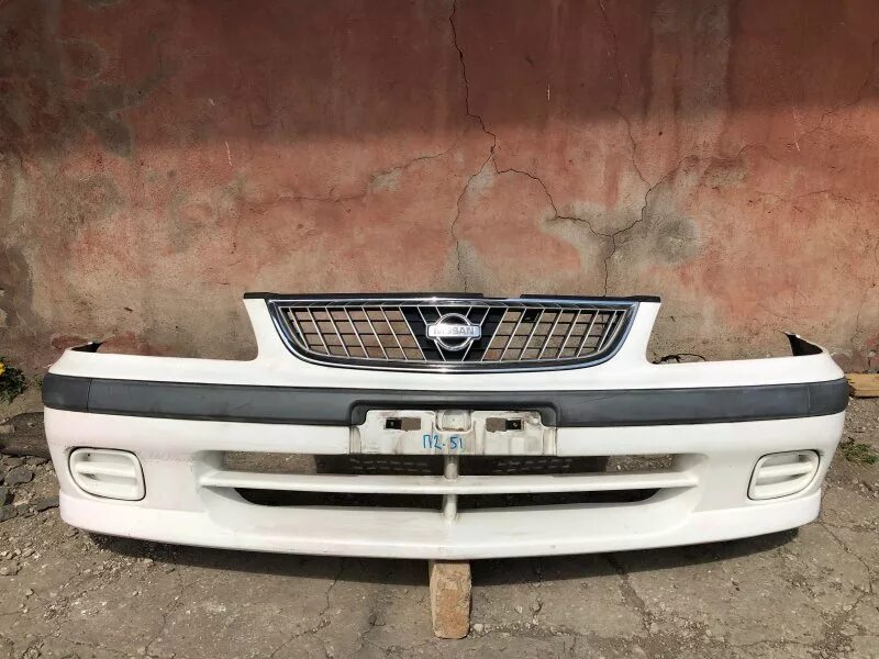 Бампер купить ярославль. Nissan Sunny b15 передний бампер. Ниссан Санни 2002 передний бампер. Бампер на Ниссан Санни б 15. Бампер передний на Ниссан Санни fb14 от 2110.