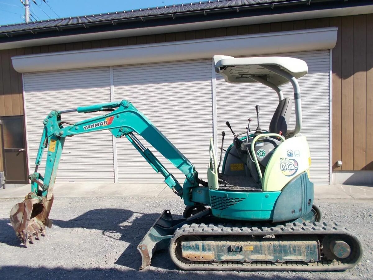 Мини янмар. Мини экскаватор yanmar vio20. мини экскаватор янмар b3. экскаватор янмар 75. мини экскаватор янмар vio 20.