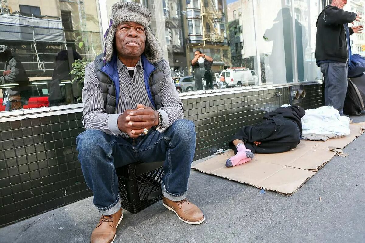 Buys homeless men