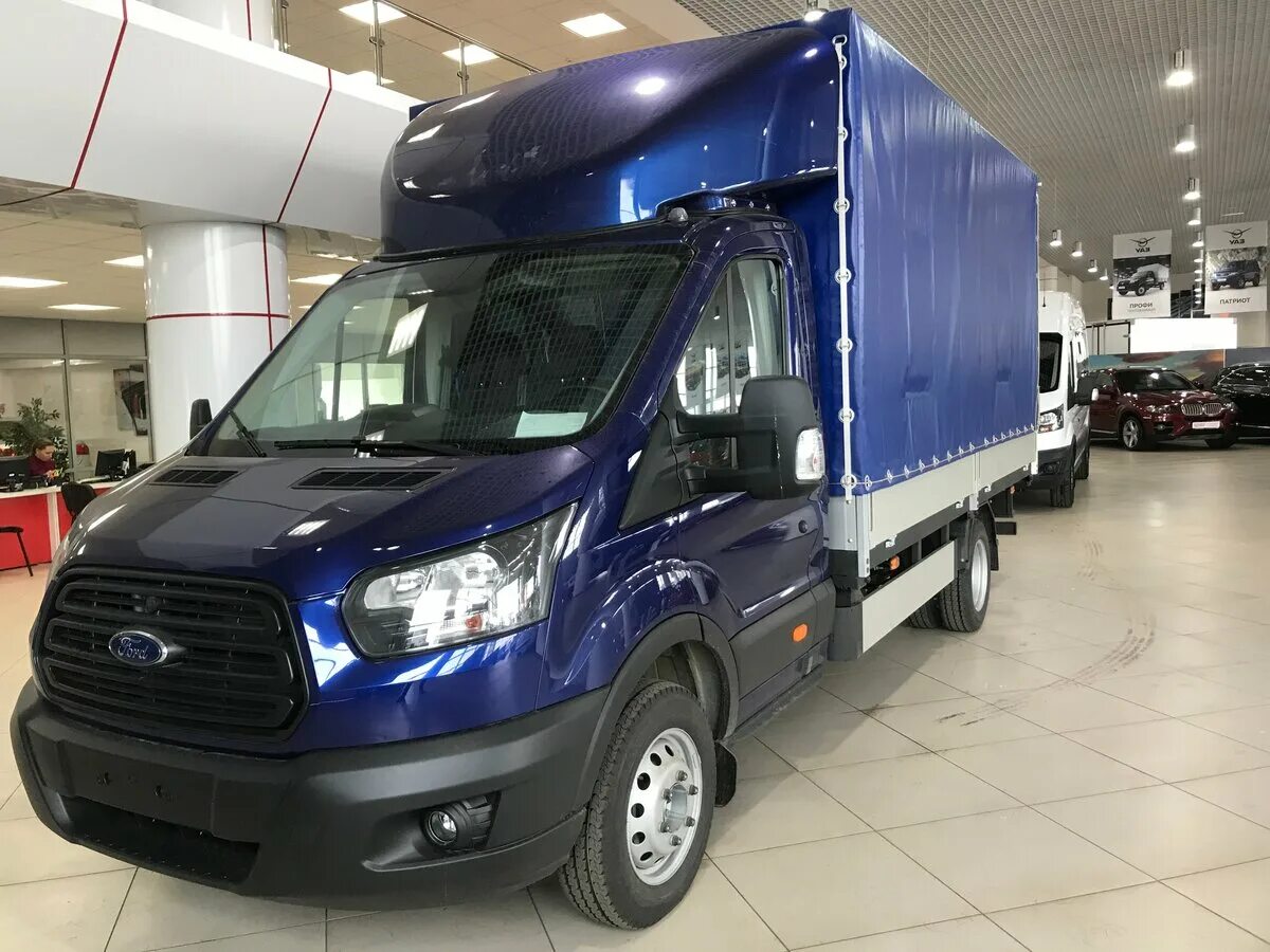 Ford transit бортовой с тентом. Форд транзит фургон тентованный. Ford transit тентованный. Ford transit бортовой 2018. Ford transit тентованный.