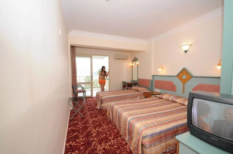 Отеле фламинго. Отель фламинго мармарис турция. фламинго отель мармарис 4. flamingo hotel 4 турция мармарис. flamingo beach hotel мармарис.