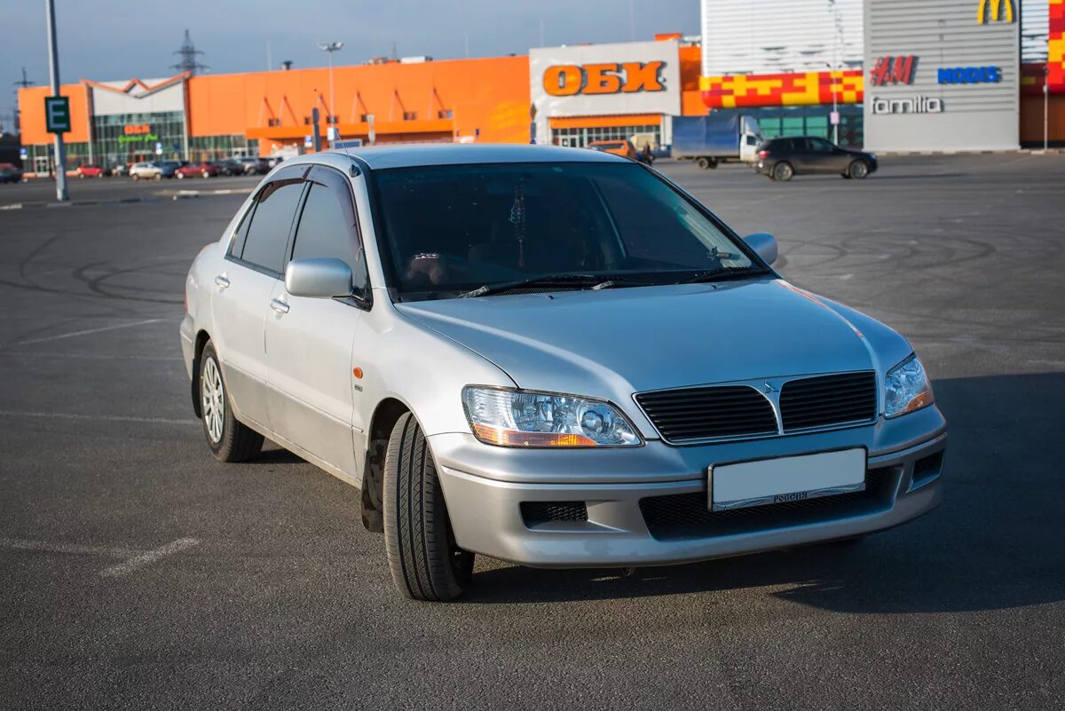 Mitsubishi Lancer 2000. Lancer 2000 года. Мицубиси ланцер 2000. Mitsubishi Lancer 2000 год. Лансер 2000 года