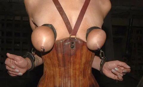 Emphasis on bondage, restraints, and tightly-bound tits. 