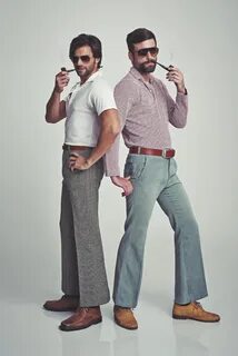 Flared trousers were a staple of men’s trendy styles. 