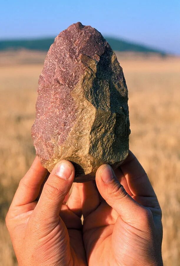 Stone tool. Ашельское рубило Экскалибур. Рубило из красного кварцита.