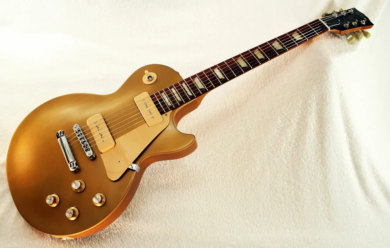 Gibson les Paul Tribute 60 p90. Гибсон лес пол. Электрогитара Гибсон лес пол. Gibson les Paul Studio Gold.