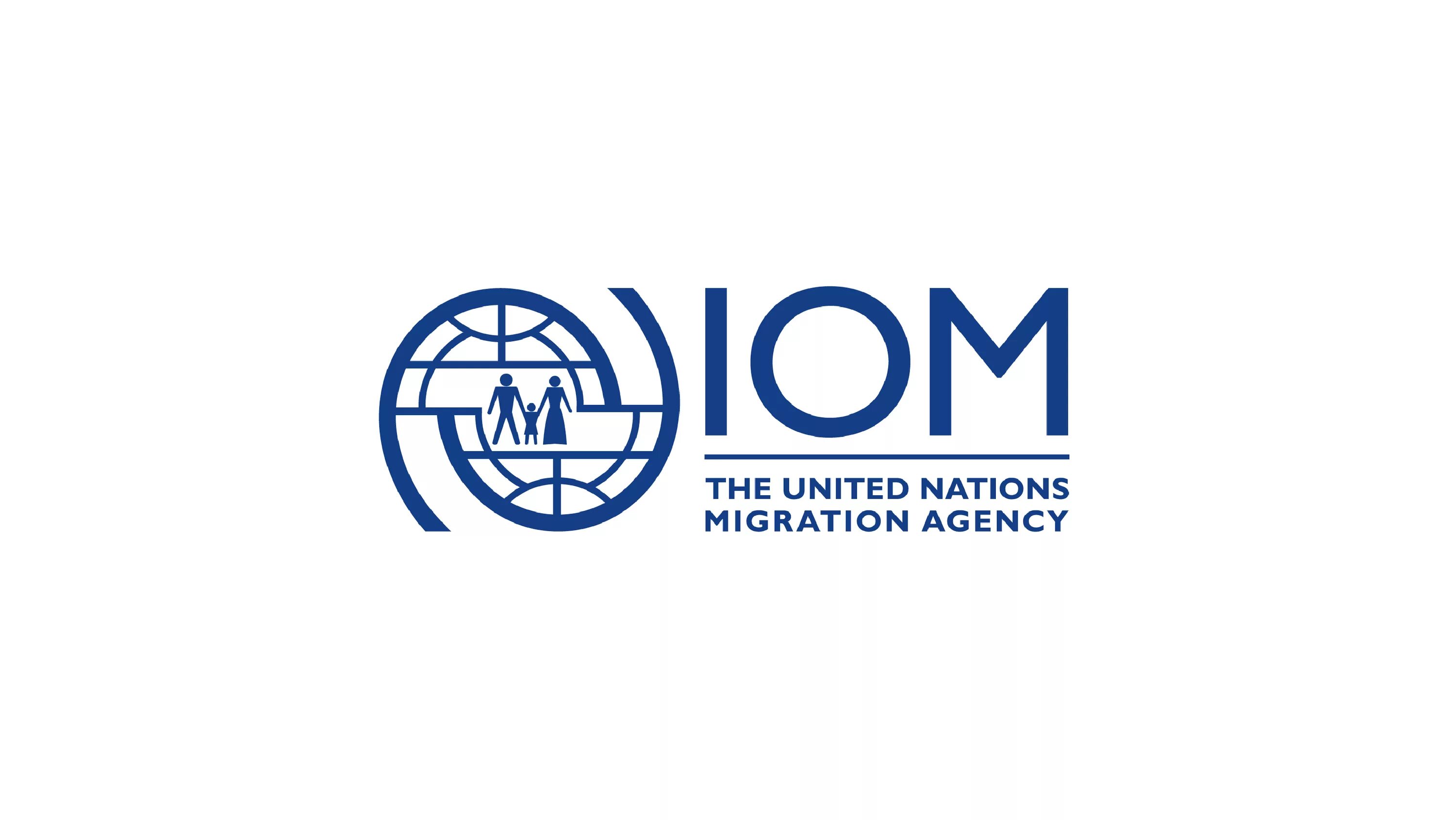 Международная организация по миграции IOM. Международная организация по миграции лого. Международная организация по миграции мом эмблема. Международная организация по миграции и Россия.