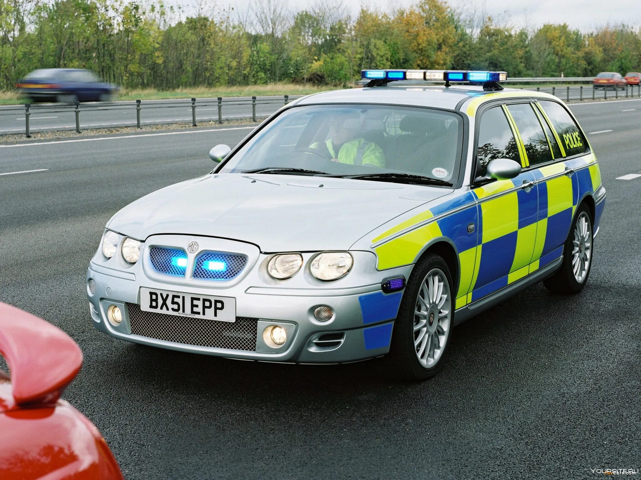 15 полицейская машина. BMW uk Police 2001. Полицейский Ровер 75. Автомобили полиции Великобритании. Полицейская машина Британия.