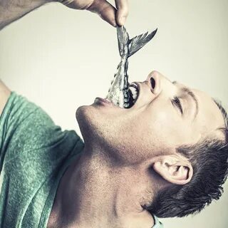 Man eats fish