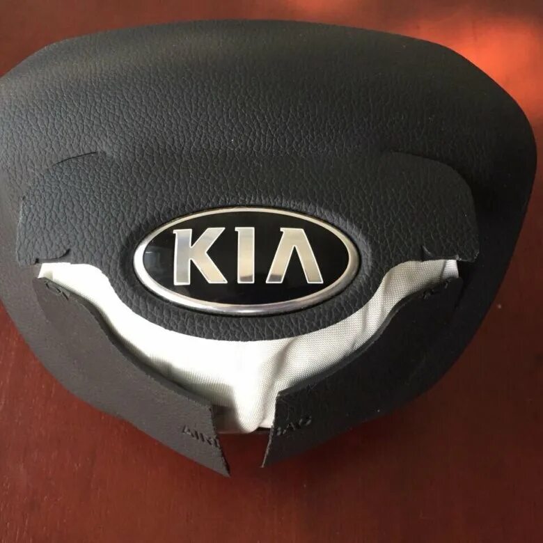 Подушки киа купить. Подушка безопасности Kia Rio. Надпись airbag Киа Рио 3. Airbag Kia Rio 3. Подушки безопасности Киа Рио 3.