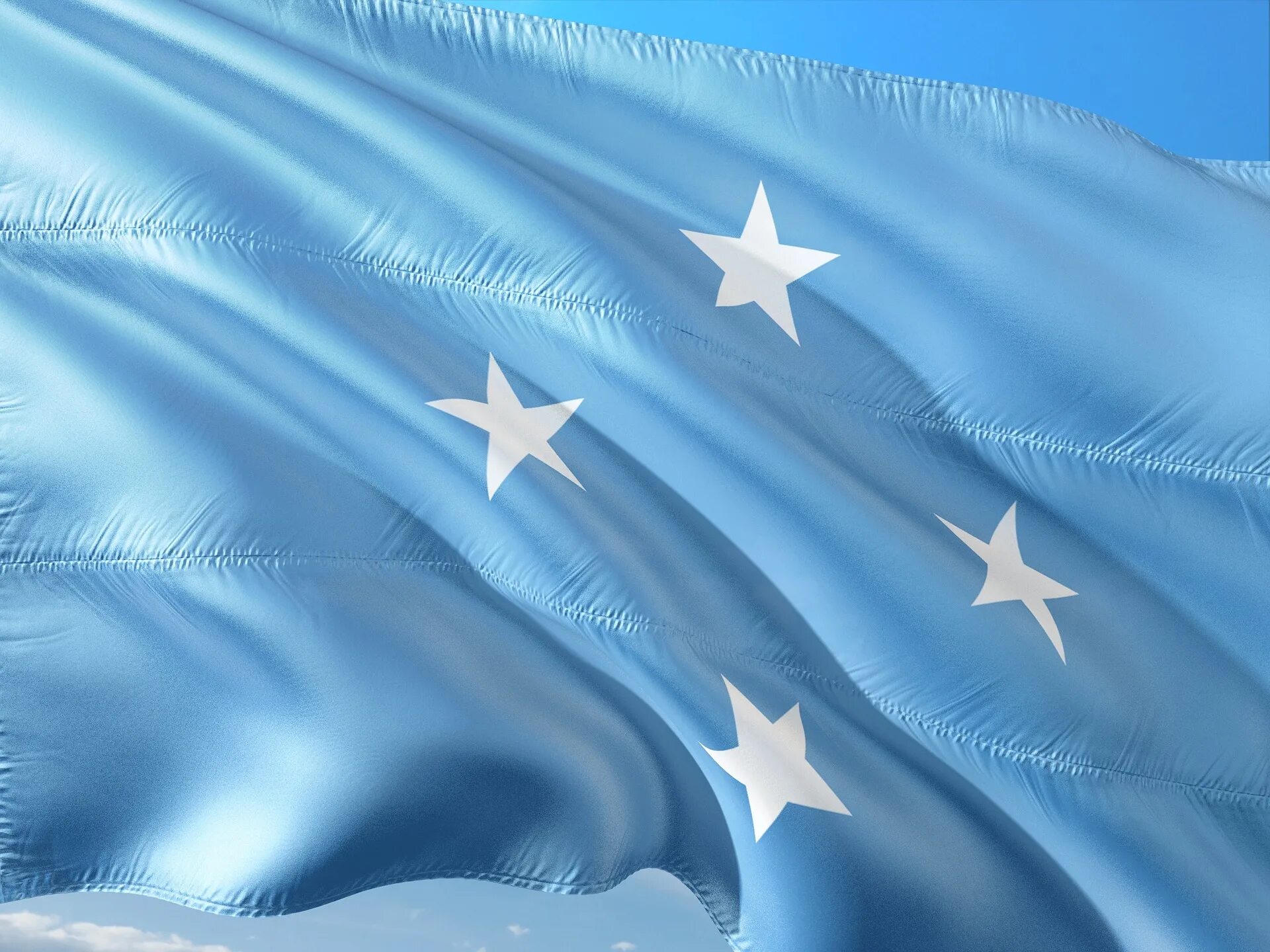 Флаг микронезии. Micronesia флаг. федеральные штаты микронезии флаг. флаг федеративных штатов микронезии фото. синий флаг.