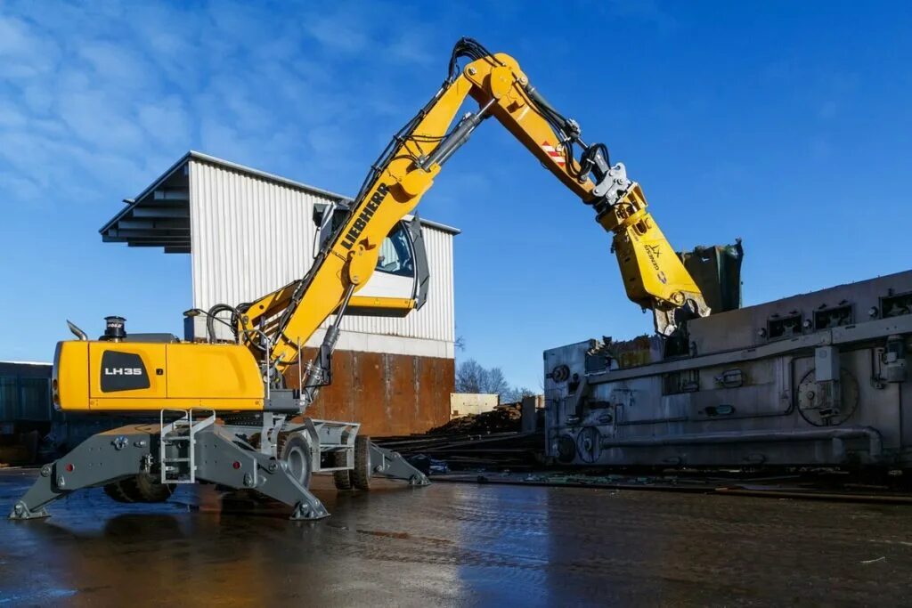 Перегружатель либхер. Liebherr lh35. экскаватор-перегружатель liebherr lh 30 m. перегружатель колесный liebherr lh 26m litronic. liebherr 35.