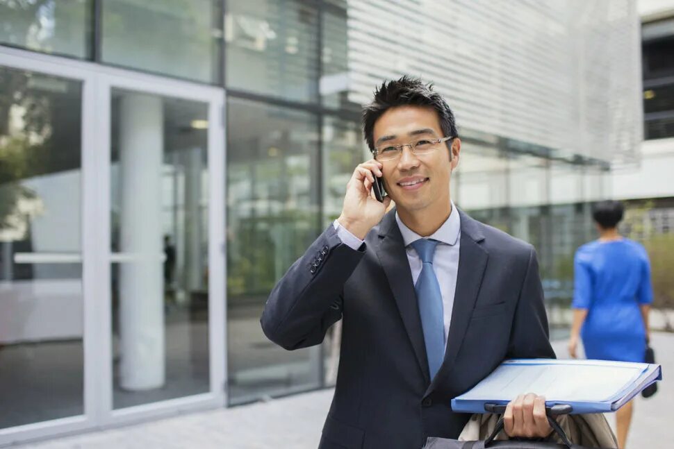 Люди в здании. Business man Phone. Businessman with Phone. Business man building. Man talk Phone.