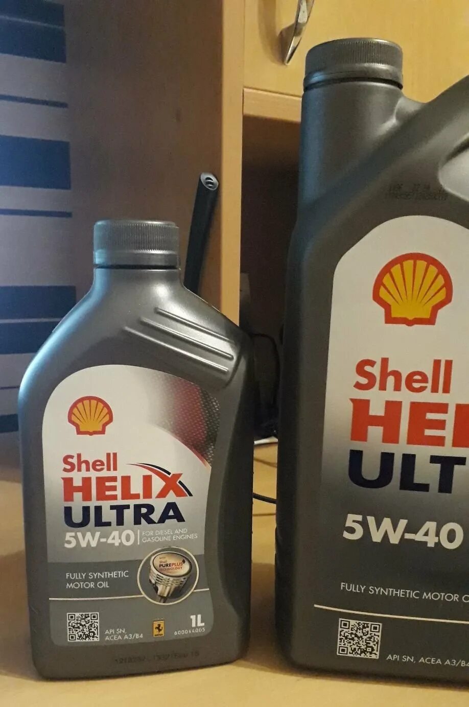 Масло шелл канистра. Shell Helix Ultra 5w30 канистра. Шелл Хеликс ультра 5w40 Старая канистра. Shell Helix Ultra 5w40 вес канистры. Шелл Хеликс ультра 5w30 канистра из Германии.