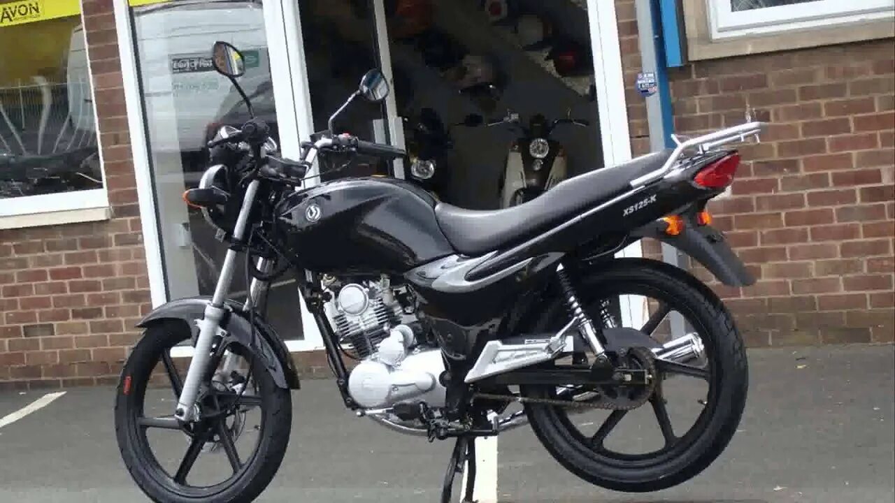 Sym xs125-k 2012. Мотоцикл sym xs 125. Sym xs 125 k заднее колесо в сборе. Sym xs125 2011. Фара sym xs 125.