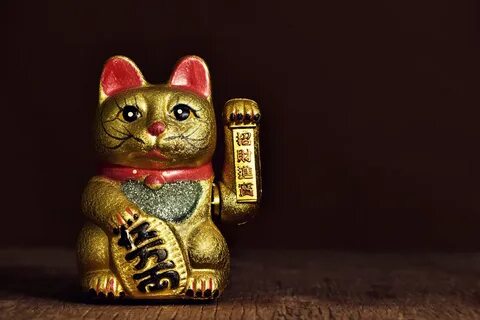 Кот для привлечения денег