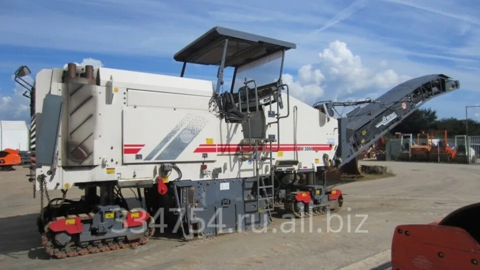 Фреза дорожная самоходная. Фреза дорожная wirtgen w2000. фреза 2000 wirtgen. фреза виртген 2000. фрезы дорожной самоходной wirtgen w2000.