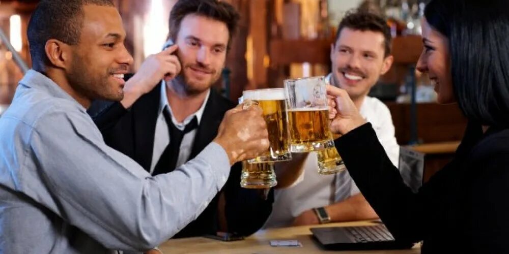 Drink after work. After work. african drinking beer after work.