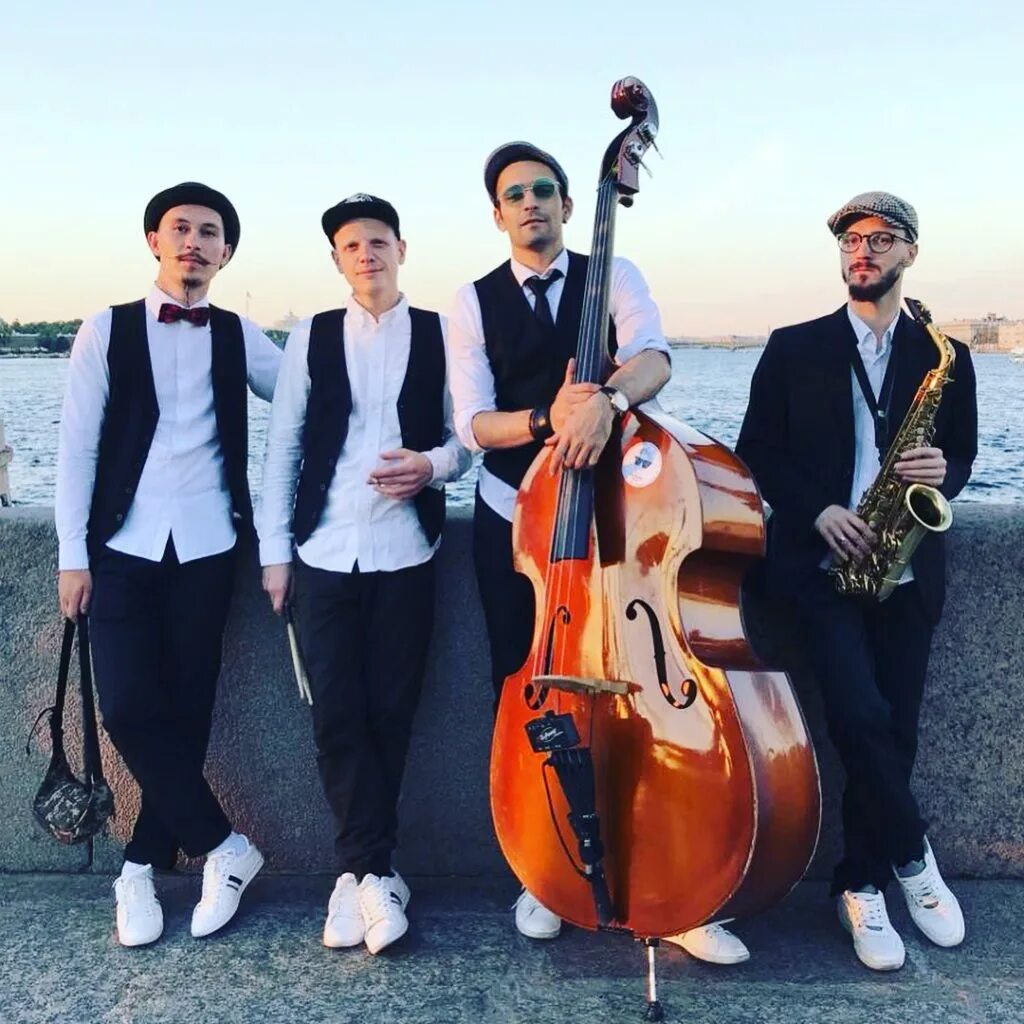 Великий гэтсби эпоха джаза. Ансамбль стиль. Дороти кавер группа. Джаз бэнд состав. Оркестр со спины.