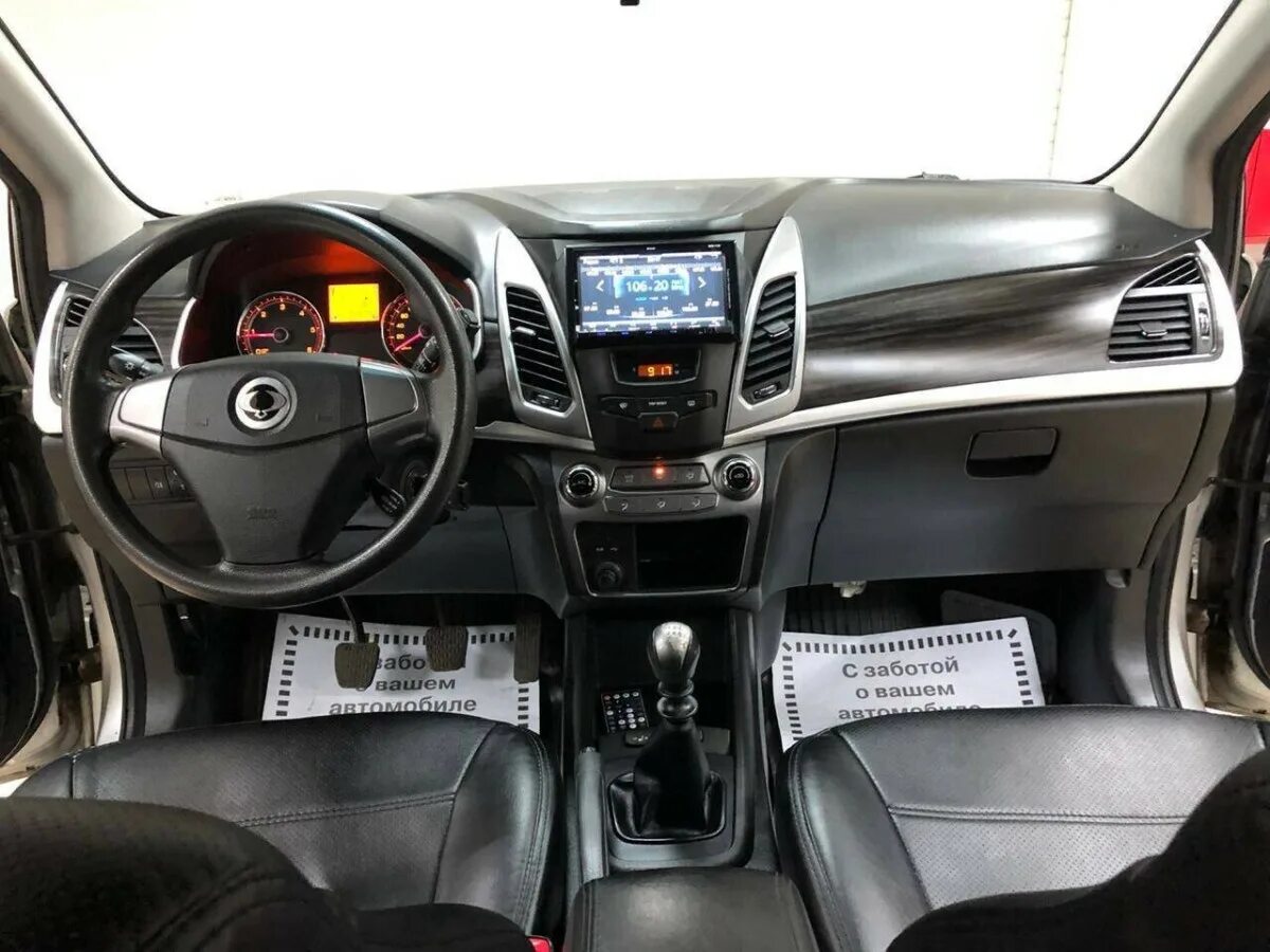 Санг енг актион рестайлинг. Ssangyong actyon 2.0 мт, 2014. саньенг актион 2014. ссан йонг актион 2014 салон. ssangyong actyon 2014 салон.