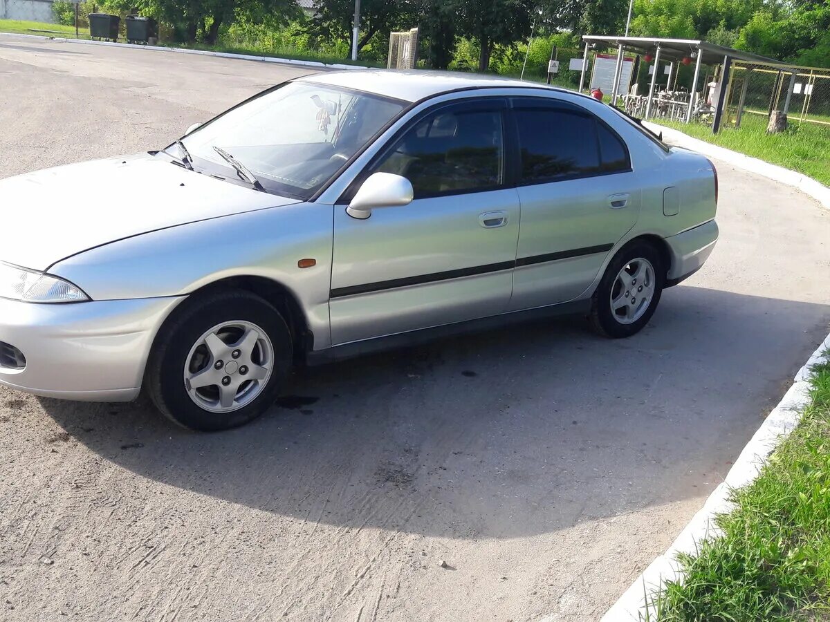 Каризма 1.3. Митсубиси Каризма 1998. Митсубиси Каризма 1998 хэтчбек. Mitsubishi Carisma 1998 хэтчбек. Митсубиси Каризма 1998 лифтбек.