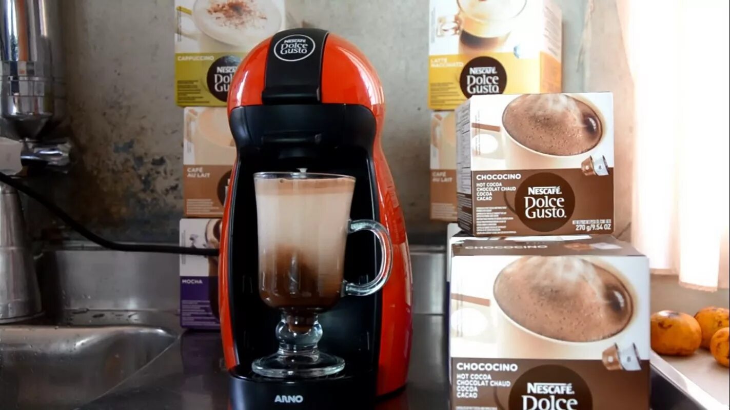 Dolce gusto как пользоваться. Кофеварка Нескафе Дольче густо капсульная. Кофемашина утенок капсульная Нескафе Дольче густо. Dolce gusto кофе аппарат.